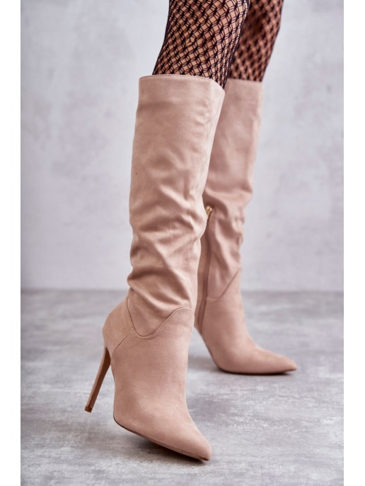 Classic Suede Black Boots On A Beige Ameya