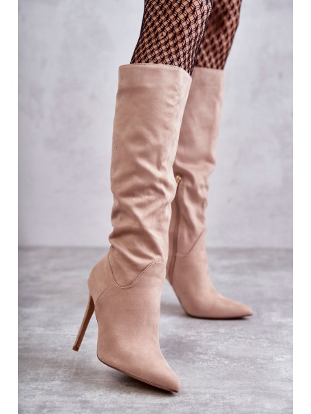 Classic Suede Black Boots On A Beige Ameya