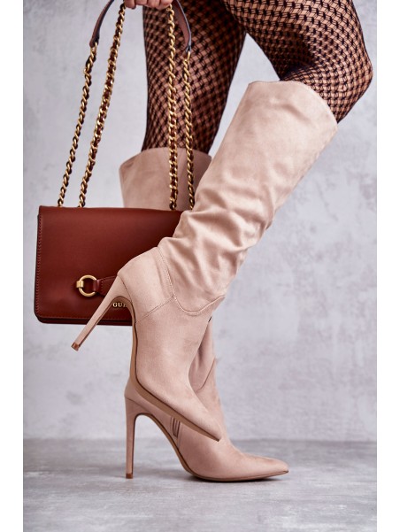 Classic Suede Black Boots On A Beige Ameya