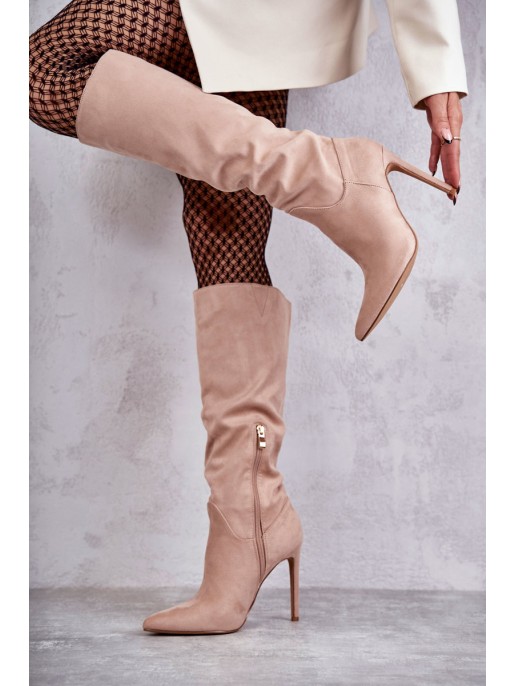 Classic Suede Black Boots On A Beige Ameya