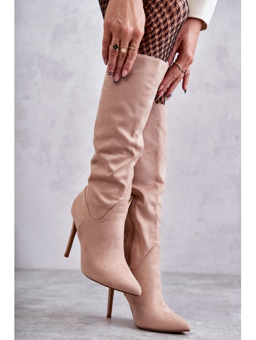 Classic Suede Black Boots On A Beige Ameya