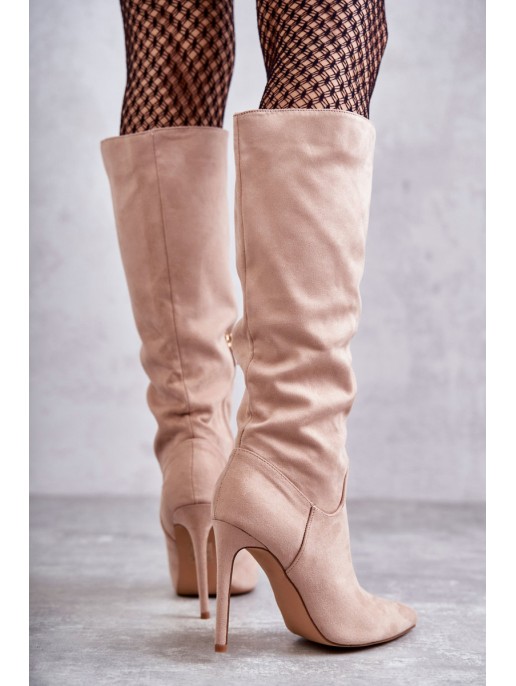 Classic Suede Black Boots On A Beige Ameya