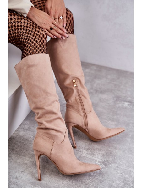 Classic Suede Black Boots On A Beige Ameya