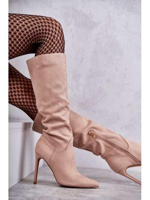 Classic Suede Black Boots On A Beige Ameya