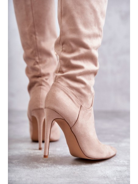 Classic Suede Black Boots On A Beige Ameya