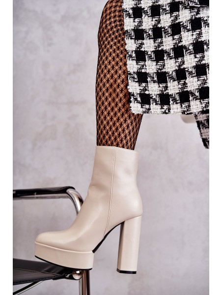 Smooth Leather Booties On A Bar Beige Kaysa