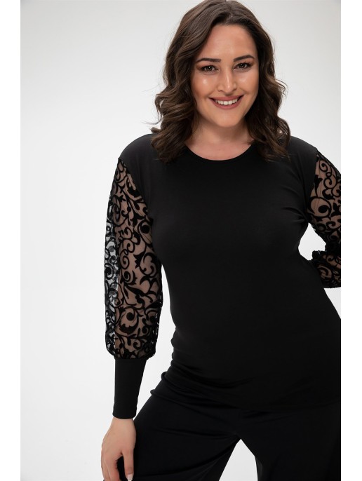 Элегантная черная блузка с необычными...