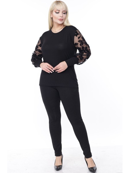 Элегантная черная блузка с необычными рукавами