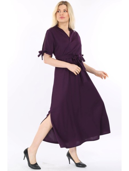 Длинное темно-фиолетовое платье на бретеле.