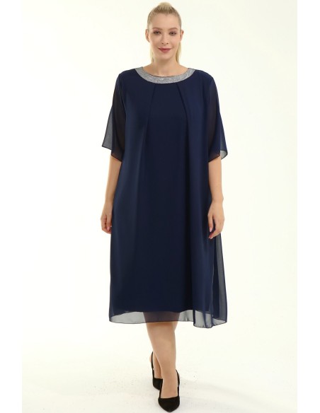 Великолепное платье свободного дизайна.