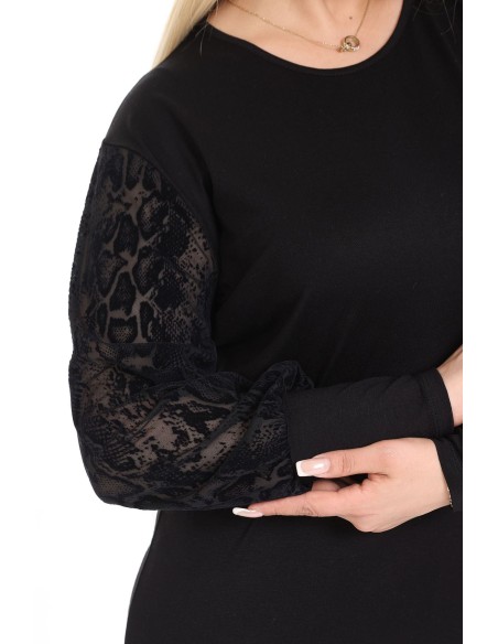 Элегантная черная блузка с необычными рукавами