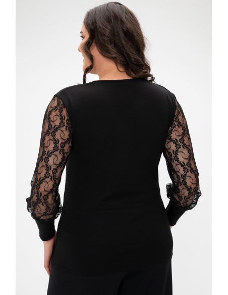 Элегантная черная блузка с необычными рукавами