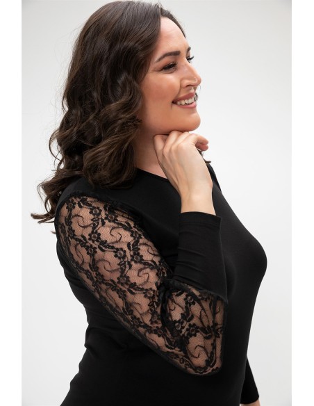 Elegantne uhkete varrukatega must pluus