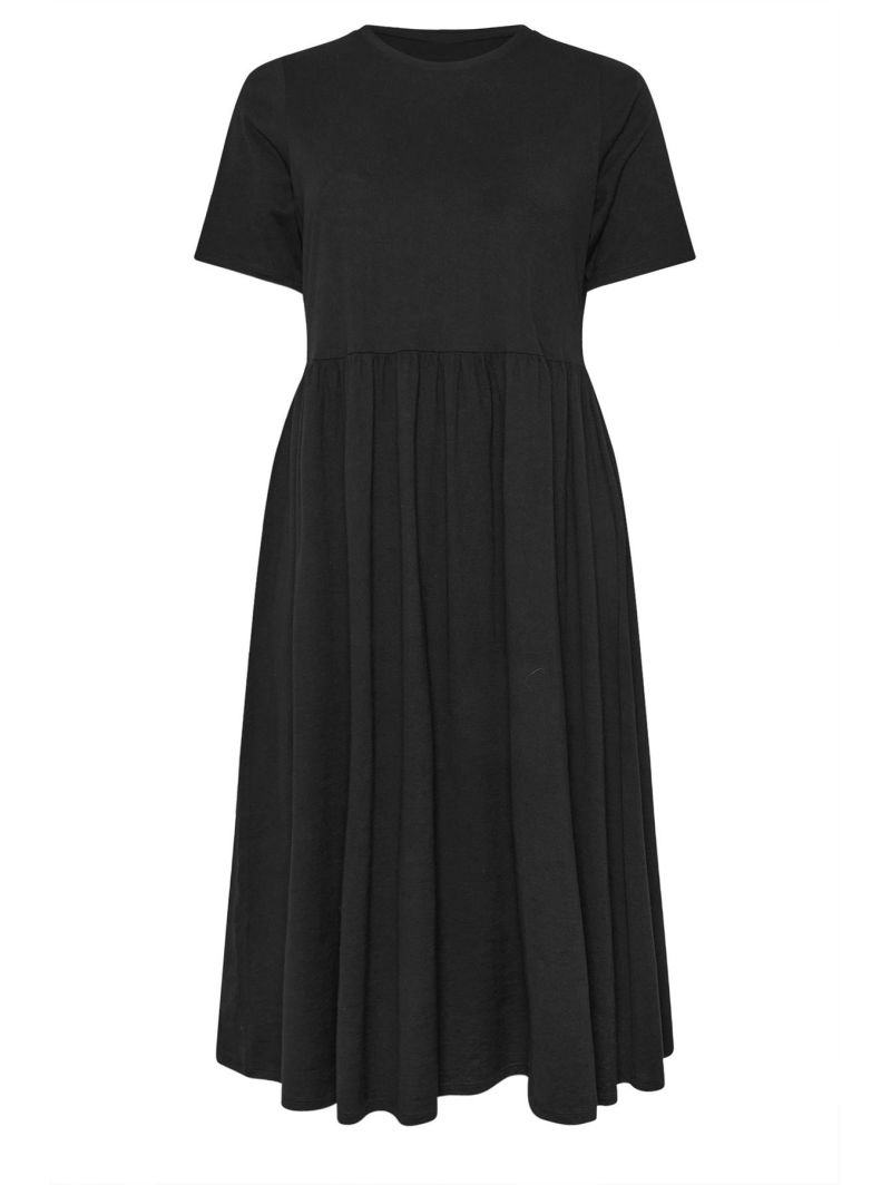 Juoda suknelė apkūnioms Juoda suknelė apkūnioms